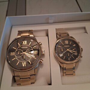 set of men's and woman's Fossil watches gold tone with black faces NEW